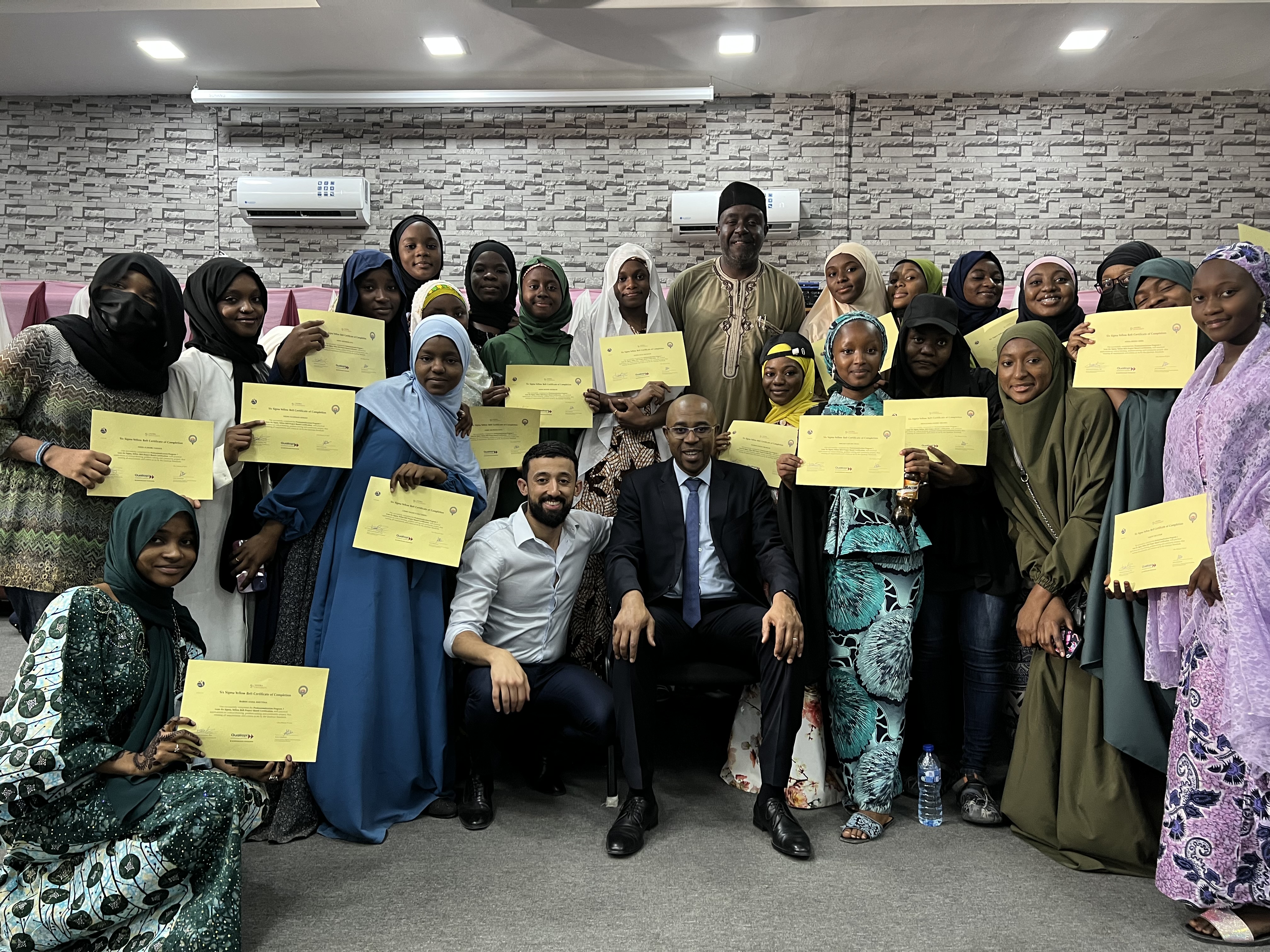 Professor Salouhou at a certificate ceremony for the Mentorship and the Lineage seminar